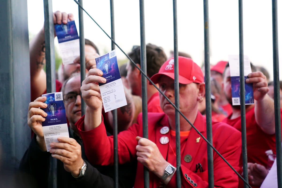 Liverpool fans show their Champions League final tickets (Adam Davy/PA) (PA Archive)