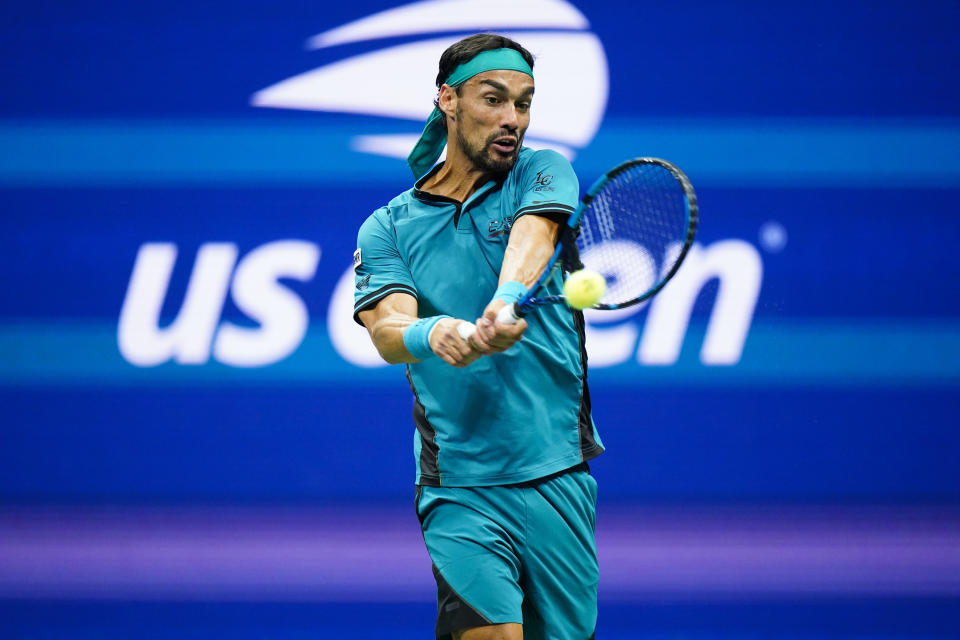 Fabio Fognini, of Italy, returns a shot to Rafael Nadal, of Spain, during the second round of the U.S. Open tennis championships, Thursday, Sept. 1, 2022, in New York. (AP Photo/Frank Franklin II)