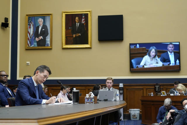 TikTok CEO Shou Zi Chew takes notes as he testifies during a hearing of the House Energy and Commerce Committee, on the platform's consumer privacy and data security practices and impact on children, Thursday, March 23, 2023, on Capitol Hill in Washington. (AP Photo/Jacquelyn Martin)