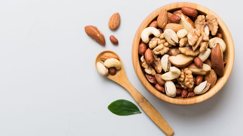 Mixed nuts in wooden bowl