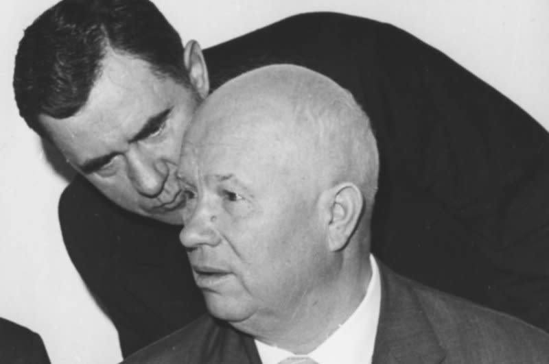 Andrei Gromyko whispers something into the ear of Soviet leader Nikita Khrushchev during a luncheon at the United Nations in New York in October 1960. On October 14, 1964, Khrushchev was ousted as premier of the Soviet Union and leader of the Soviet Communist party. UPI File Photo