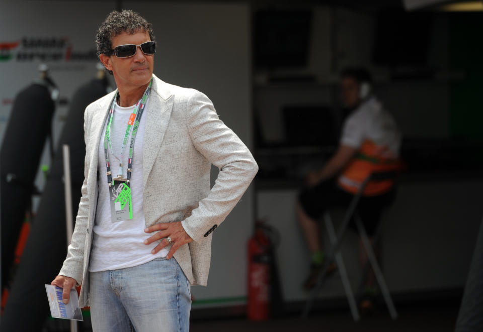 Spanish actor Antonio Banderas stands prior racing at the Circuit de Monaco on May 27, 2012 in Monte Carlo during the Monaco Formula One Grand Prix. AFP PHOTO / DIMITAR DILKOFFDIMITAR DILKOFF/AFP/GettyImages