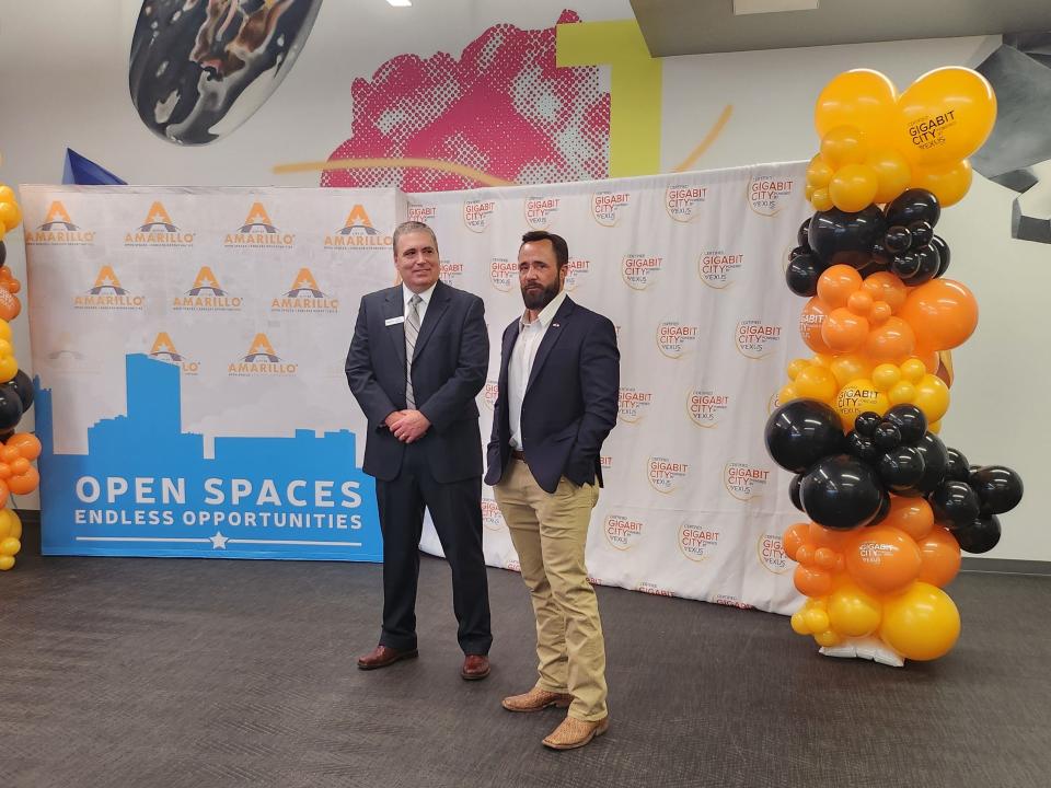 Brian Borthwick, Director of Operations for Vexus in Amarillo, left, and Amarillo Mayor Cole Stanley announce the city of Amarillo as a certified Vexus Fiber Gigabit City during a reception held Tuesday morning at the Innovation Outpost.