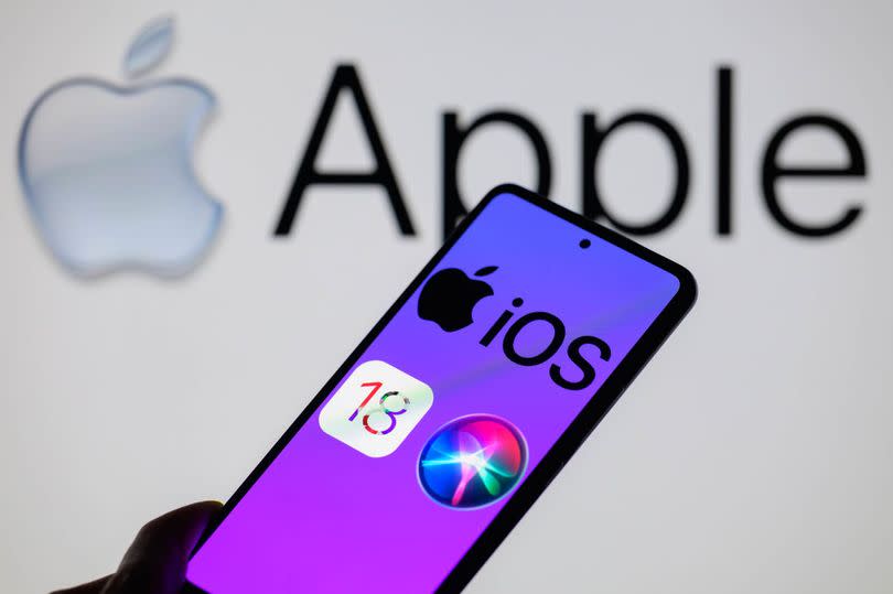 The Apple iOS 18 logo and Siri AI icon are being displayed on a smartphone, seen in this photo illustration in Brussels, Belgium, on June 10, 2024. (Photo Illustration by Jonathan Raa/NurPhoto via Getty Images)
