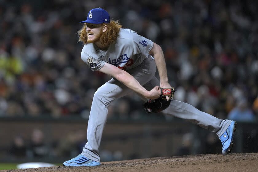 Dodgers pitcher Dustin May works against the San Francisco Giants during the fifth inning Sept. 16, 2022.