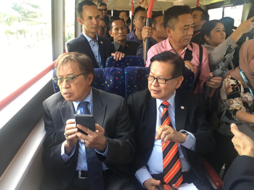 Sarawak Chief Minister Datuk Patinggi Abang Johari Openg (left) and Transport Minister Datuk Lee Kim Shin aboard a hydrogen-powered bus in Kuching January 21, 2020. — Picture by Sulok Tawie