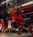 CHICAGO, IL - MARCH 12: Derrick Rose #1 of the Chicago Bulls lets out a scream after dunking the ball against the New York Knicks at the United Center on March 12, 2012 in Chicago, Illinois. The Bulls defeated the Knicks 104-99. NOTE TO USER: User expressly acknowledges and agrees that, by downloading and or using this photograph, User is consenting to the terms and conditions of the Getty Images License Agreement. (Photo by Jonathan Daniel/Getty Images)