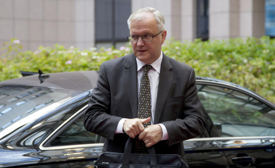 European Commissioner for the Economy Olli Rehn arrives for a meeting of eurogroup finance ministers at the EU Council building in Brussels on Monday, Nov. 26, 2012. Eurozone finance ministers are set to meet in Brussels on Monday to discuss the next installment of bailout money for debt-laden Greece. (AP Photo/Virginia Mayo