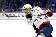 FILE - In this Dec. 14, 2019, file photo, Washington Capitals left wing Alex Ovechkin follows through on a shot against the Tampa Bay Lightning during the first period of an NHL hockey game in Tampa, Fla. Ovechkin starts a new five-year contract ready to chase Wayne Gretzky's career goals record that long seemed unbreakable. The Washington Capitals captain has 730 goals and needs 165 to pass Gretzky. (AP Photo/Chris O'Meara, File)