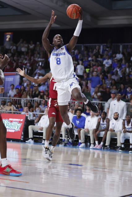 In a photo provided by Bahamas Visual Services, Memphis' David Jones (8) shoots during the second half of an NCAA college basketball game against Arkansas in the Battle 4 Atlantis at Paradise Island, Bahamas, Thursday, Nov. 23, 2023. (Tim Aylen/Bahamas Visual Services via AP)