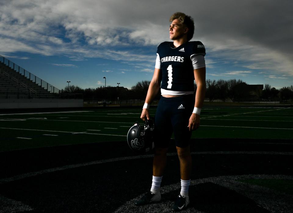 Corner Canyon’s Isaac Wilson poses for Mr. Football photos in Draper on Dec. 6, 2023.