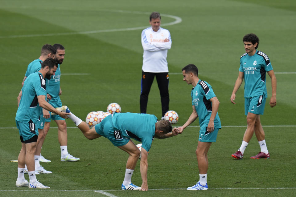 Real Madrid's Toni Kroos, lower centre, trains with team mates during a Media Opening day training session in Madrid, Spain, Tuesday, May 24, 2022. Real Madrid will play Liverpool in Saturday's Champions League soccer final in Paris. (AP Photo/Manu Fernandez)