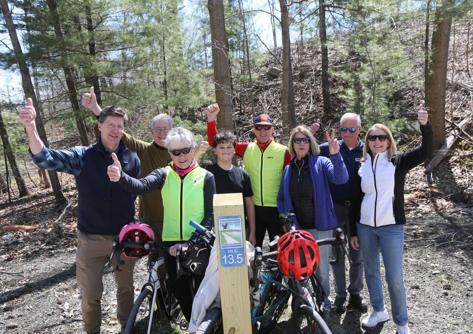 Members of the The New Hamphire Seacoast Greenway in Portsmouth are proud to show off the stretch that many bikers and pedestrians are already using. From left are Scott Bogle, Jeff Latimer, Sue Allen, Reid Perkins, Dave Allen, Sally Baybutt, Clark James and Paula Rais.