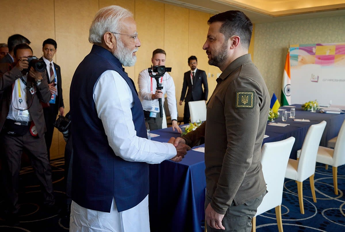 Ukraine’s president Volodymyr Zelensky (R) shaking hands with India’s prime minister Narendra Modi (Ukrainian Presidential Press Ser)