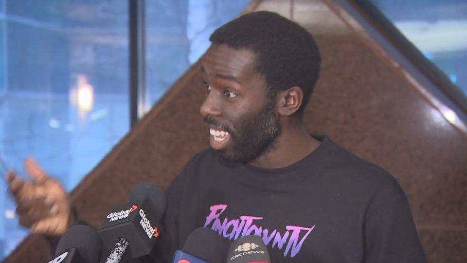 Activist and journalist Desmond Cole speaking to reporters Tuesday morning. Cole, who says he's a friend of Fowlin's, says the chief's administrative investigation is not a success story.