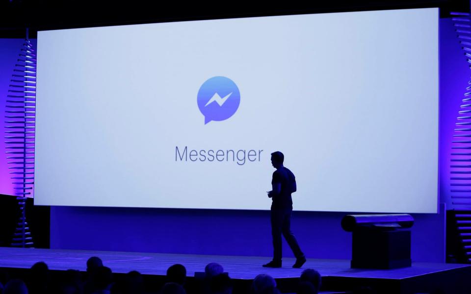 Facebook Messenger logo projected onto a screen - Eric Risberg/AP