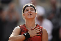 FILE - Karolina Muchova of the Czech Republic celebrates winning her semifinal match of the French Open tennis tournament against Aryna Sabalenka of Belarus in three sets, 7-6 (7-5), 6-7 (5-7), 7-5, at the Roland Garros stadium in Paris, Thursday, June 8, 2023. Muchova is expected to compete at Wimbledon next week. (AP Photo/Thibault Camus, File)