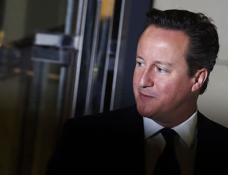 Britain's Prime Minister David Cameron arrives for his interview on "The Andrew Marr Show" on the first day of the Conservative Party Conference in Birmingham central England September 28, 2014. REUTERS/Luke MacGregor