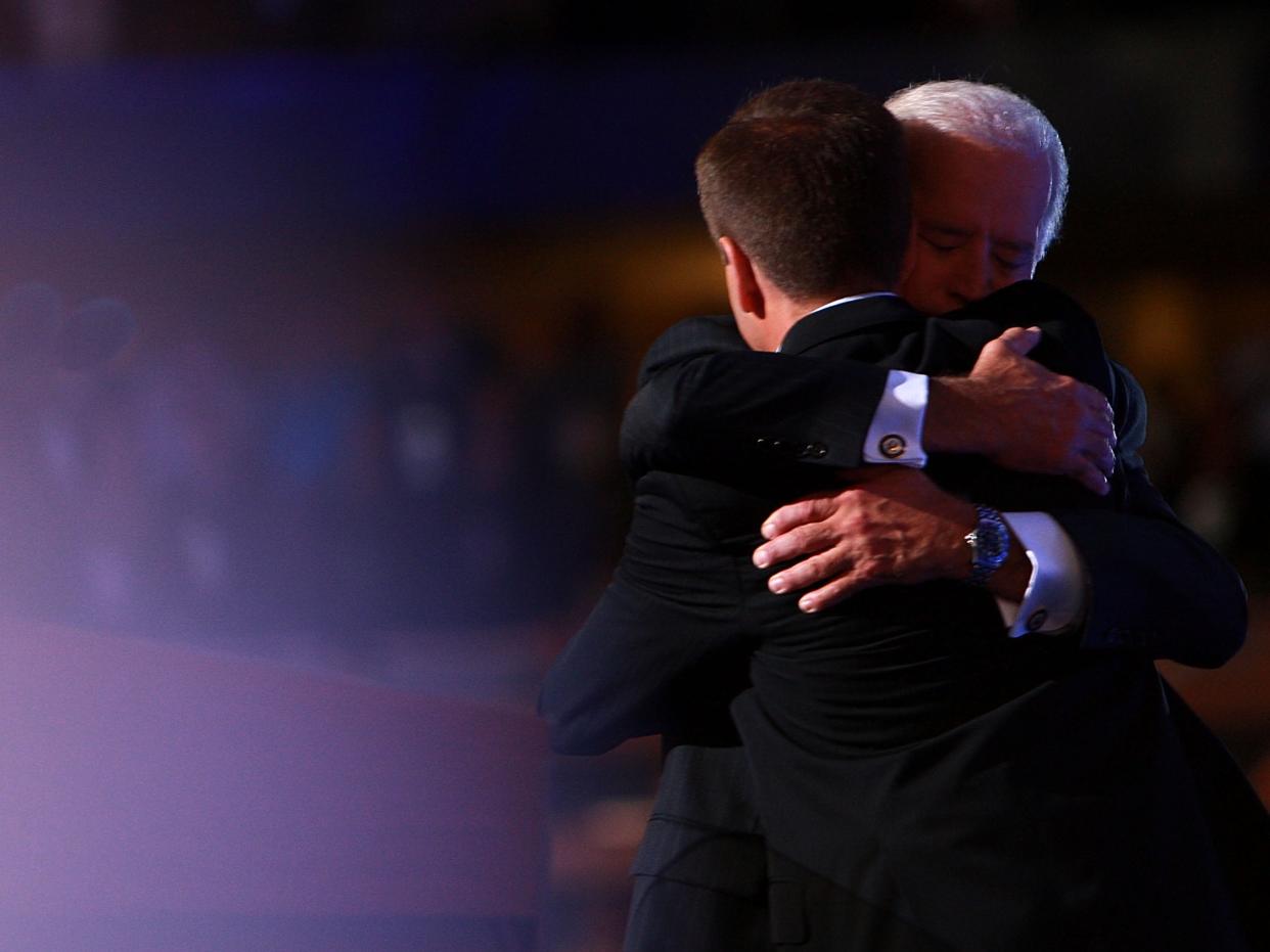 <p>Joe Biden hugs his late son Beau Biden, during day three of the Democratic National Convention (DNC) at the Pepsi Centre 27 August 2008 in Denver, Colorado</p> ((Getty Images))