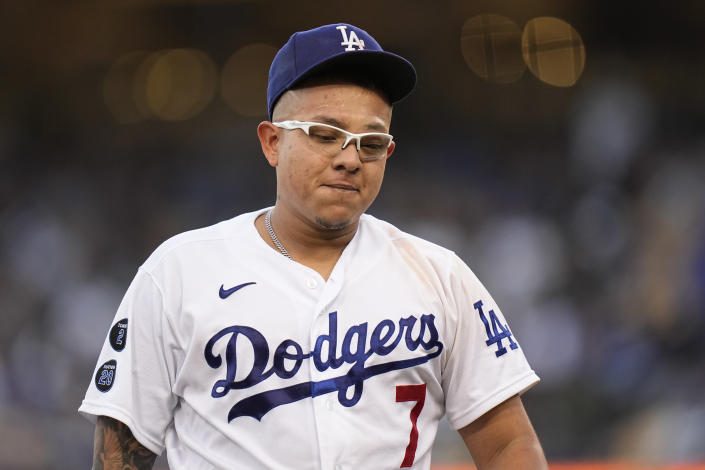 Los Angeles Dodgers pitcher Julio Urias walks back to the dugout out after the second inning against the Atlanta Braves in Game 4 of baseball's National League Championship Series Wednesday, Oct. 20, 2021, in Los Angeles. (AP Photo/Jae Hong)