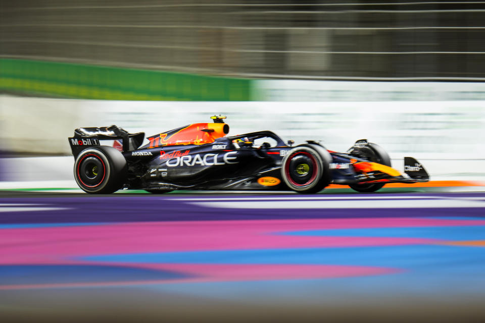 Red Bull driver Sergio Perez of Mexico steers his car during the Saudi Arabia Formula One Grand Prix at the Jeddah corniche circuit in Jeddah, Saudi Arabia, Sunday, March 19, 2023. (AP Photo/Hassan Ammar)