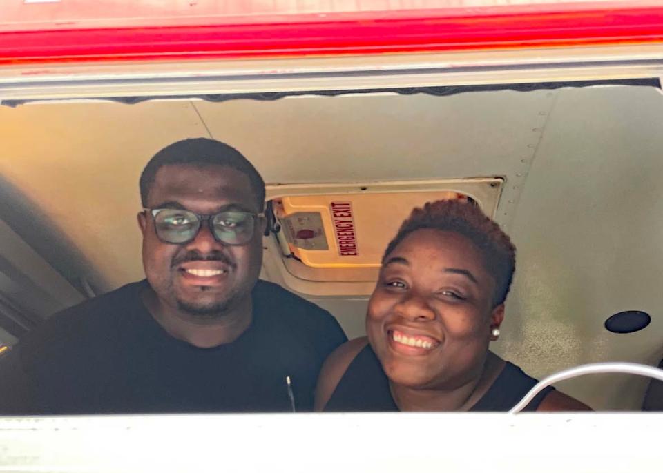 Sharday and Samanda Westbrook serve up burgers from their food truck, Tasteful Bite Burgers, at the Food Truck Freedom Field Day event held at Mayor Ralph McGill Plaza in Farragut Saturday, Aug. 20, 2022.