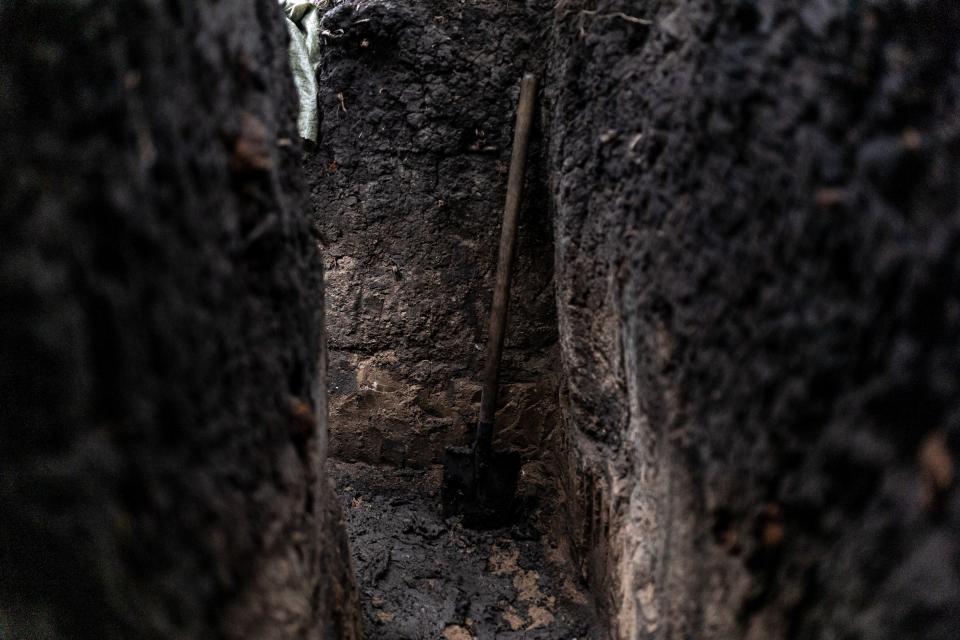 A shovel in a trench on the frontline contact line in Lugansk oblast, Ukraine, 29 July 2023.