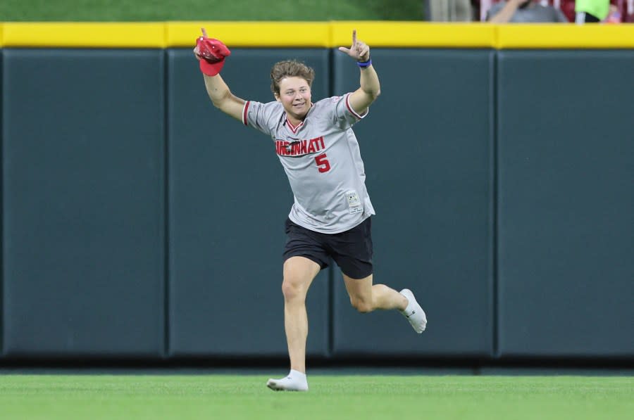 CINCINNATI, OHIO – JUNE 11: An unidentified fan runs on the field before the ninth inning of the Cincinnati Reds against Cleveland Guardians at Great American Ball Park on June 11, 2024 in Cincinnati, Ohio. (Photo by Andy Lyons/Getty Images)