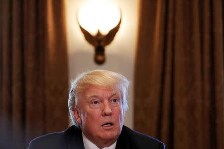 U.S. President Donald Trump attends a meeting with the Congressional Black Caucus Executive Committee at the White House in Washington, DC, U.S., March 22, 2017. REUTERS/Carlos Barria