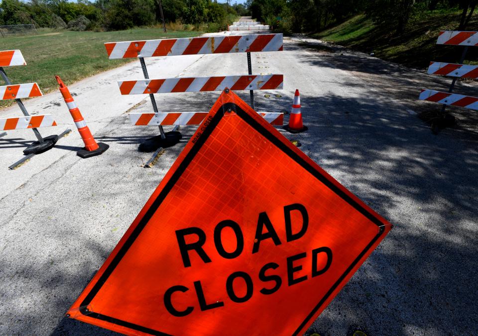 A sign warns of a bridge closing on East South 7th Street in October.