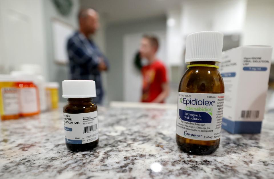 Epidiolex cannabidiol sits on the kitchen counter as Kyle Sintz and his son Isaac Sintz talk at their home in South Jordan on Wednesday, March 22, 2023. Isaac, 16, has Dravet Syndrome, a severe form of epilepsy, and uses the medication to treat his seizures. | Kristin Murphy, Deseret News