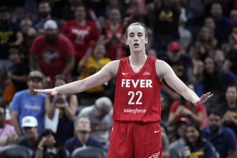 Indiana Fever's Caitlin Clark reacts during the second half of a WNBA basketball game against the New York Liberty, Saturday, July 6, 2024, in Indianapolis. (AP Photo/Darron Cummings)