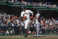 San Francisco Giants' J.D. Davis heads to the dugout after hitting a solo home run against the Arizona Diamondbacks during the sixth inning of a baseball game in San Francisco, Saturday, Oct. 1, 2022. (AP Photo/Godofredo A. Vásquez)