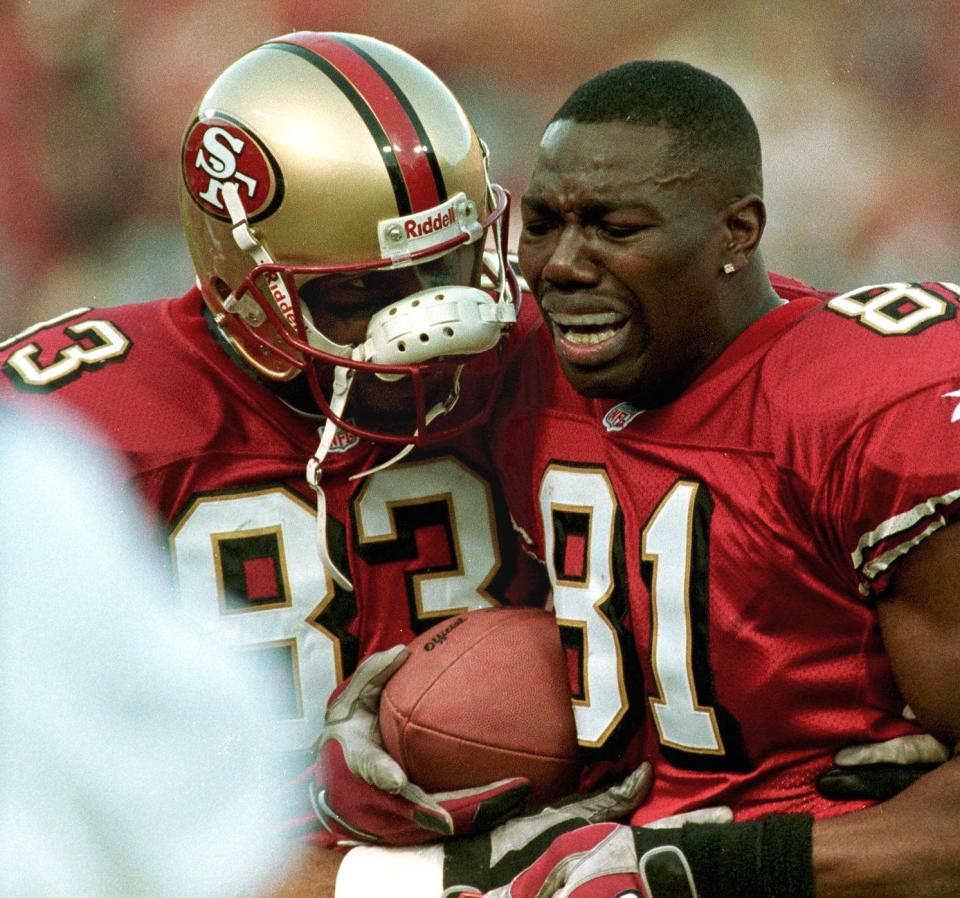 Terrell Owens always played with emotion, which he showed after his winning catch in the 1999 wildcard game. (Getty)