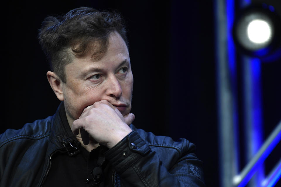 FILE - Tesla and SpaceX chief executive officer Elon Musk listens to a question as he speaks at the SATELLITE Conference and Exhibition in Washington, March 9, 2020. (AP Photo/Susan Walsh, File)