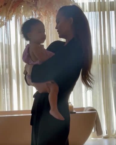 <p>Chrissy Teigen/Instagram</p> Chrissy Teigen dancer with daughter Esti