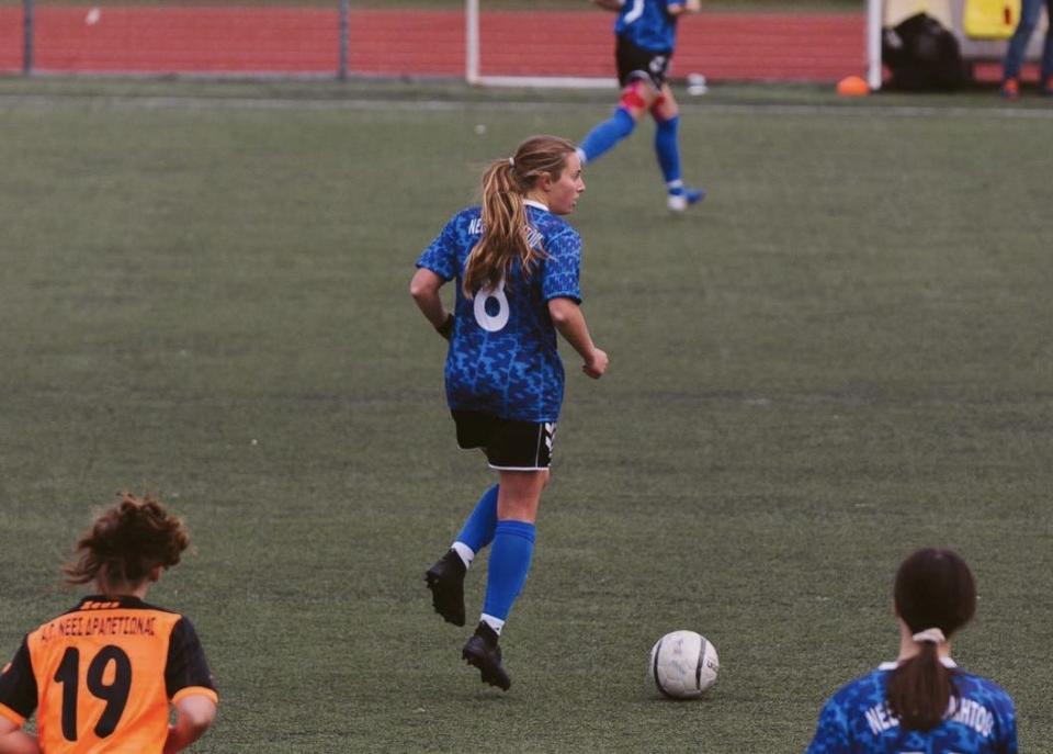 McKaela Schmelzer, the former Harlem star who went on to star at the University of Wisconsin-Milwaukee, is now playing for a professional soccer team just outside of Athens, Greece. Here she dribbles down field during a game last month.