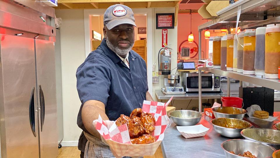 Wingz and a Prayer owner Kurt Cummings offers up a fresh batch of wings.