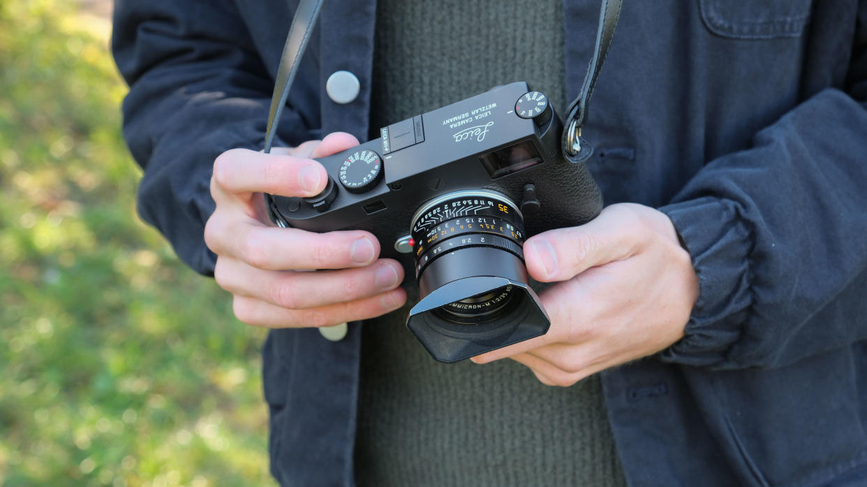  Leica M11-P camera held in hands. 
