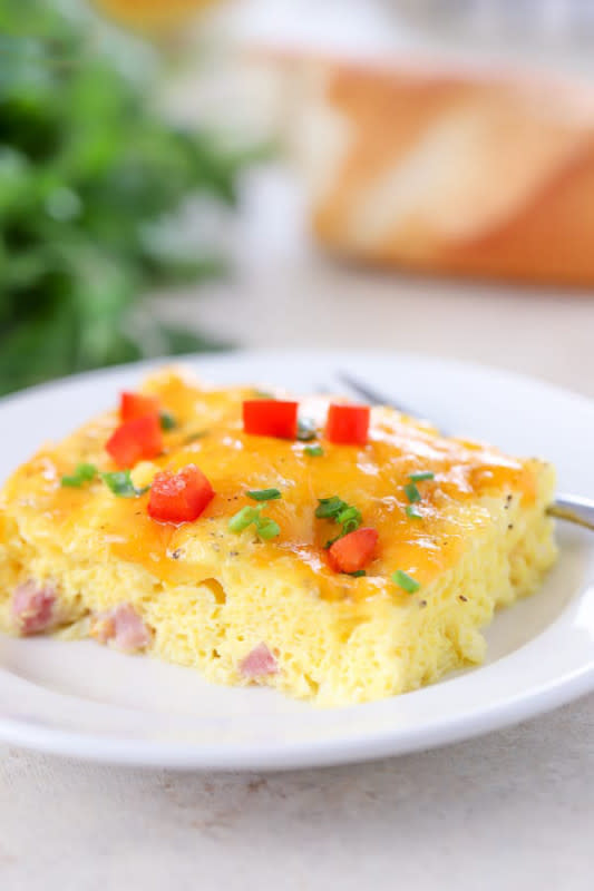 <p>Get the recipe: <a href="https://celebratingsweets.com/egg-casserole/" rel="nofollow noopener" target="_blank" data-ylk="slk:Fluffy Egg Casserole;elm:context_link;itc:0;sec:content-canvas" class="link "><strong>Fluffy Egg Casserole</strong></a></p>