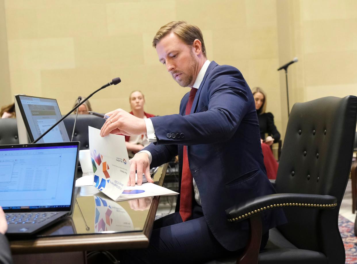 Oklahoma state schools Superintendent Ryan Walters prepares his presentation Jan. 10 at a House committee hearing.