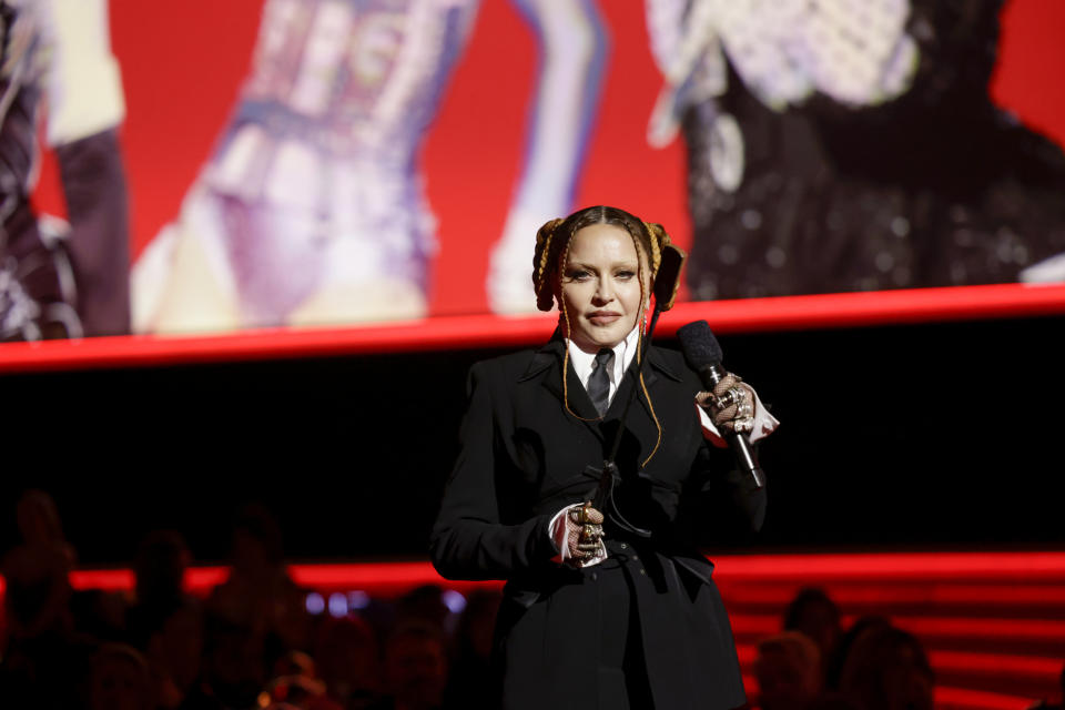 closeup of her on stage holding a mic