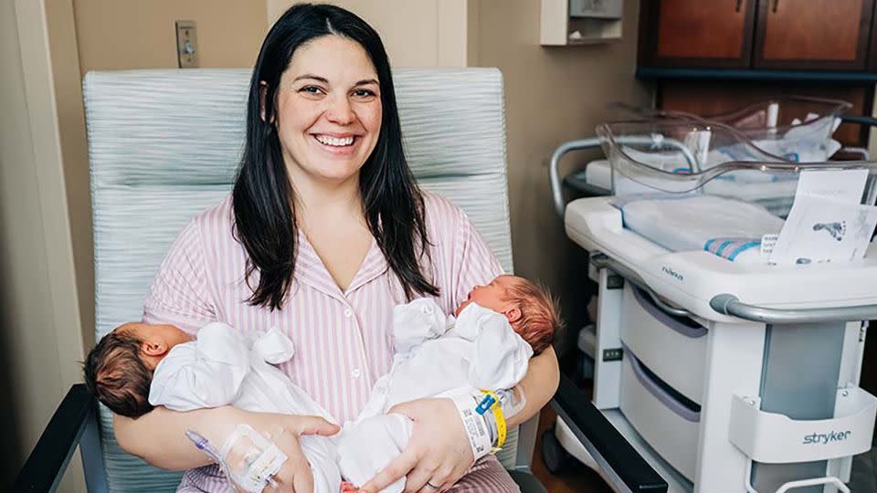 Kelsey Hatcher gave birth to two girls after becoming pregnant in both of her two uteruses earlier this year. Kelsey holds Roxi on the left and Rebel on the right. - Andrea Mabry/University of Alabama at Birmingham Hospital