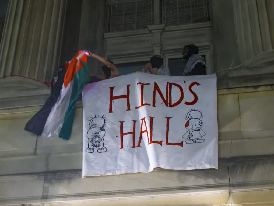 NEW YORK, UNITED STATES – APRIL 30: A group of Columbia University students, advocating for Palestinians, access the iconic Hamilton Hall building as they gather to stage a demonstration at the campus in New York, United States on April 30, 2024. Protests are sweeping college campuses across the US following a police attempt to clear a pro-Palestinian encampment at Columbia University, resulting in the arrest of over 100 students. Columbia University asked students on Monday to ‘voluntarily disperse’ amid stalled talks, threatening the students with suspension. (Photo by Selcuk Acar/Anadolu via Getty Images)