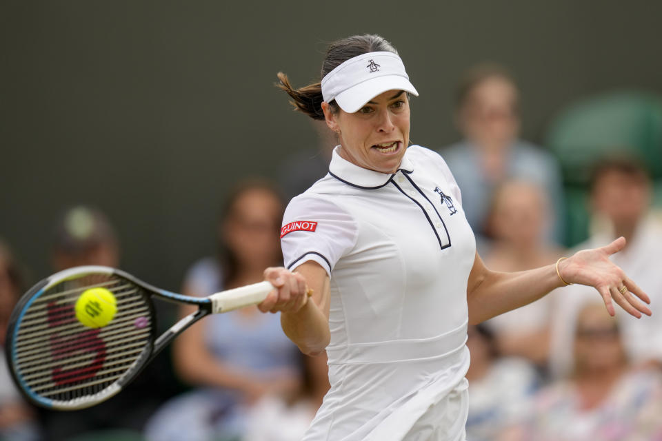 Australia's Ajla Tomljanovic hits a forehand to France's Alize Cornet during a women's singles fourth round match on day eight of the Wimbledon tennis championships in London, Monday, July 4, 2022. (AP Photo/Kirsty Wigglesworth)