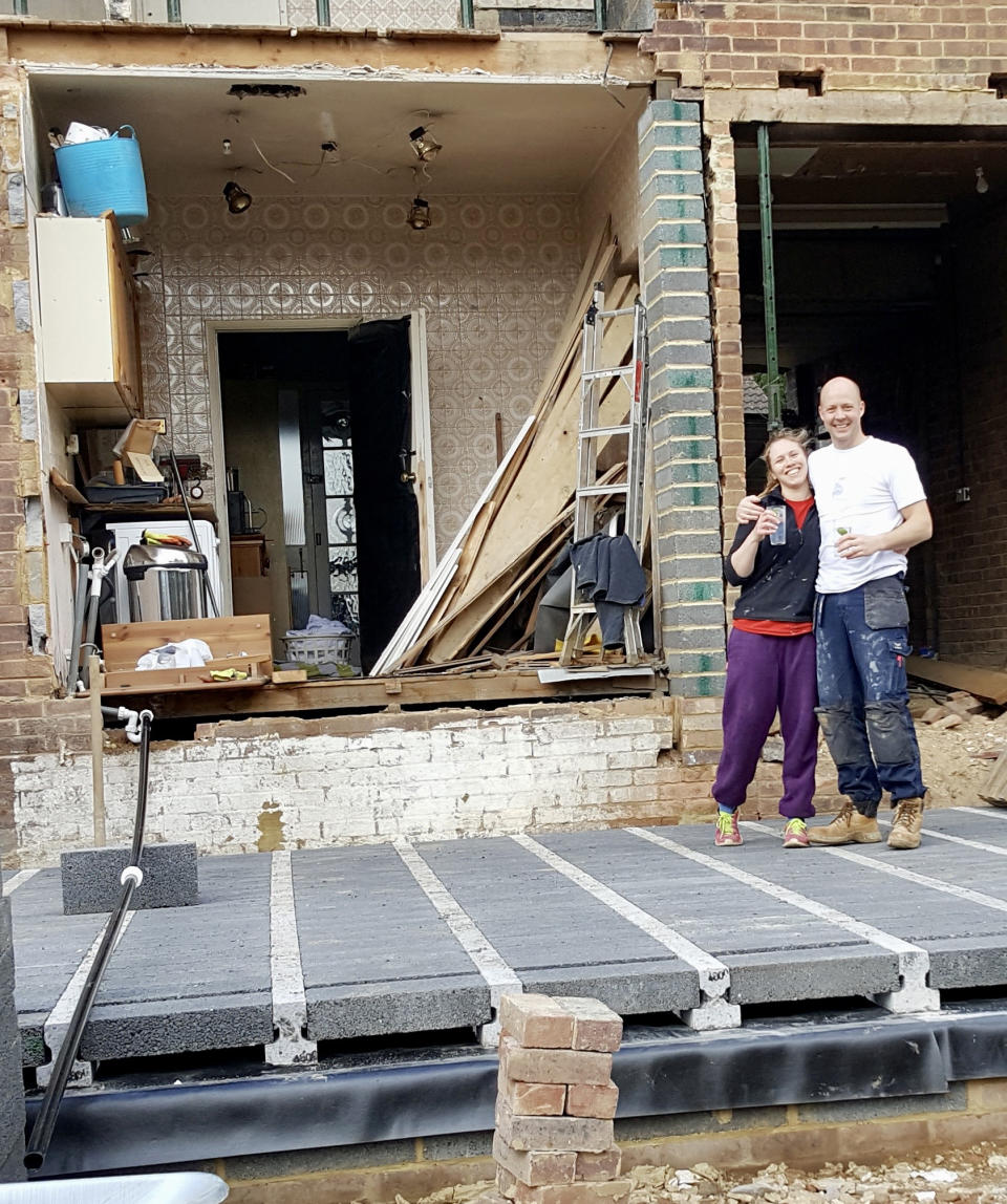 Lizzy and Phil Williams at their four-bed St Albans house during the renovation. (SWNS)