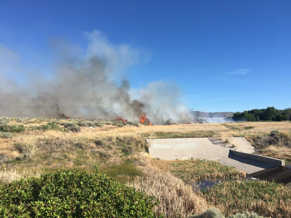Reno firefighter responded to a brush fire near the Barnes & Noble warehouse May 27, 2020.