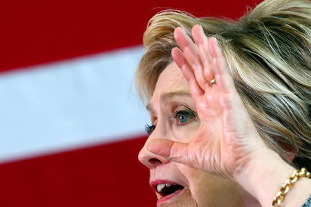 U.S. Democratic presidential candidate Hillary Clinton leads a discussion on gun violence prevention with family members of victims at the Wilson-Gray YMCA in Hartford, Connecticut, U.S., April 21, 2016. REUTERS/Adrees Latif