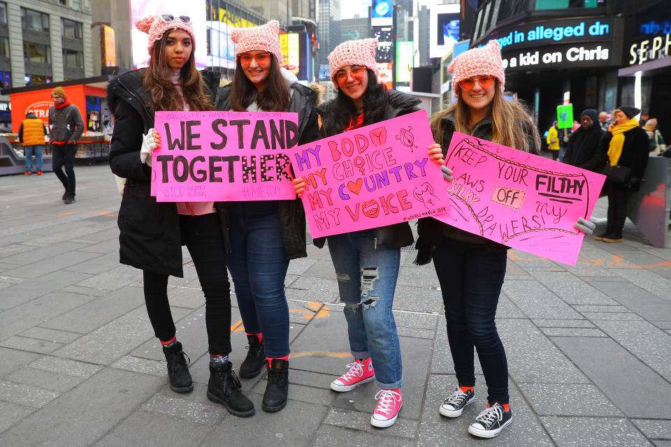 Erica Vasquez, Marie Monteleone, Amanda Castelli and Vicky Murray display their signs following the Women’s March in New York City on Jan. 19, 2019. (Photo: Gordon Donovan/Yahoo News)