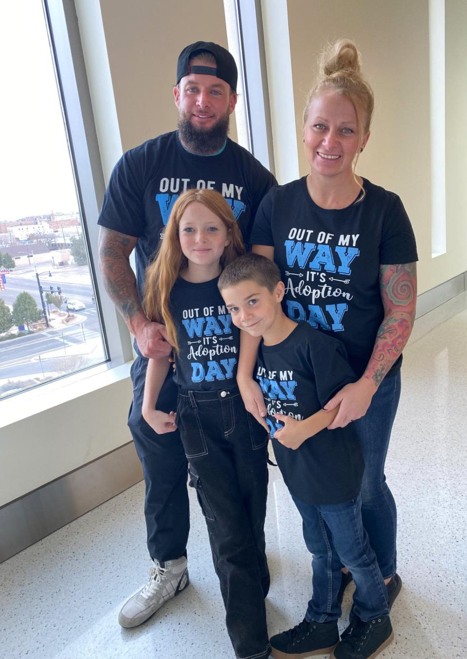 The Sloan family, including dad Dillon, mom Kayleigh and siblings Gracie, 10, and Maddoux, 7, celebrate making Maddoux an official part of their family during National Adoption Day Friday, Nov. 3, 2023 at the Pueblo County Courthouse.